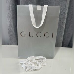 Authentic Gucci, gray empty paper bag with ribbon